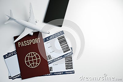 Top view of airplane tickets mobile phone and documents Stock Photo