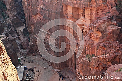 Top view of Al Khazneh or Treasury - Nabatean rock-cut temple of Hellenistic period of ancient Petra, originally known to Stock Photo