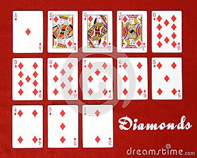 Top view of all diamond playing cards from the table placed on a red table Stock Photo