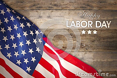 America flag with text of Happy Labor Day on table Stock Photo