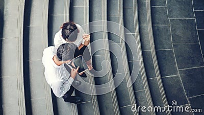 Top view of Asian business people meeting and using digital tablet outdoor after work Stock Photo