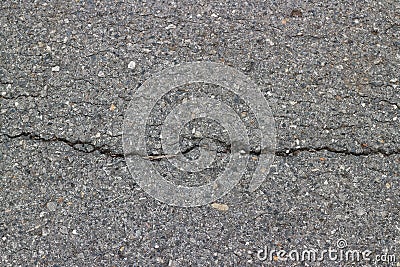 top view asphalt road surface outdoor image for background with cracks and soil subsidence Stock Photo