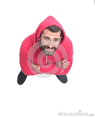 Top view .attentive guy in a red jacket looking at the camera Stock Photo