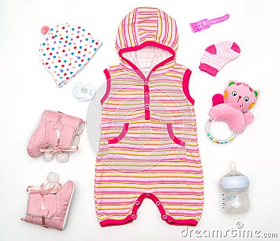 Top view of baby girl clothes and toy stuff Stock Photo