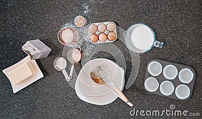 Top view, baking product and kitchen counter with eggs, flour and butter utensils on table. Food and cooking ingredients Stock Photo