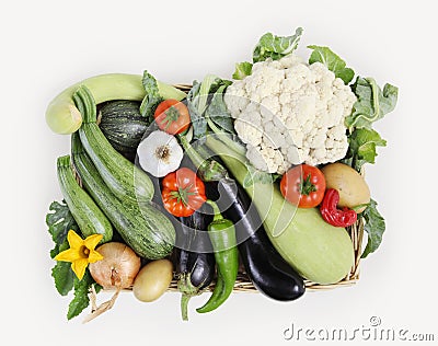 Top view basket of vegetables, cauliflower, tomatoes, zucchini, Stock Photo
