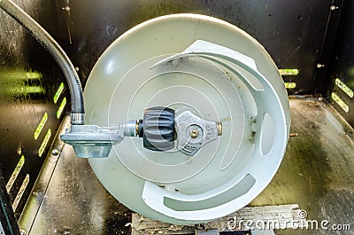 Top view of BBQ propane tank and regulator Stock Photo