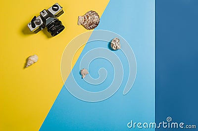 Top view of beach with accessories on colourful graphical background Stock Photo