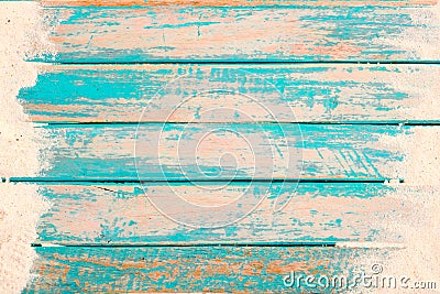 Top view of beach sand on old wood plank in blue sea paint background. Stock Photo