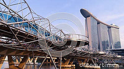 Top view beautiful Singapore city skyline with view of Helix bridge and Marina Bay Sands Hotel with park on background Editorial Stock Photo