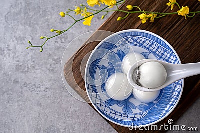 Top view of big tangyuan yuanxiao in a bowl on gray background for lunar new year food Stock Photo