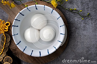 Top view of big tangyuan yuanxiao in a bowl on gray background for lunar new year food Stock Photo