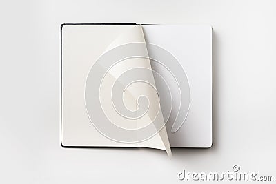 Top view of black notebook with curl rolled page Stock Photo