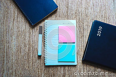 Top view blank space of post note and notebook decorate with pen and book Stock Photo