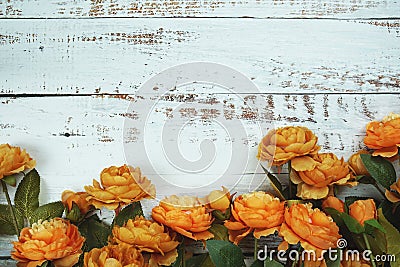 Top view Blooming Flowers frame with copy space on wooden background Stock Photo