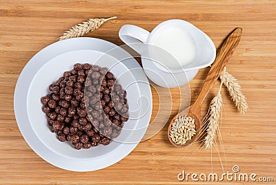 Top view of breakfast cereal chocolate balls and milk Stock Photo