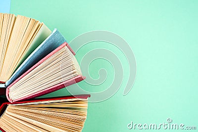 Top view of bright colorful hardback books in a circle. Stock Photo