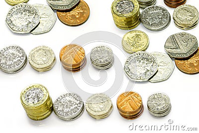 Top view of British currency coins as vertical and stack isolate on white background Editorial Stock Photo