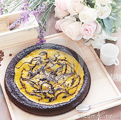 Top view of brownie cheese pond on wood plate Stock Photo