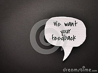 Top view bubble speech with text We want your feedback Stock Photo