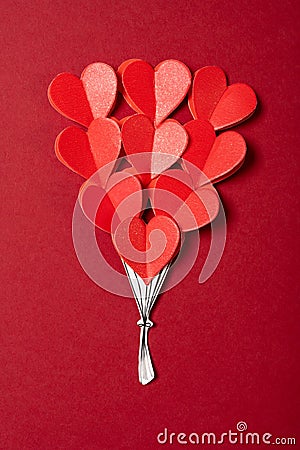 top view bunch of red hearts on red background vertical composition Stock Photo