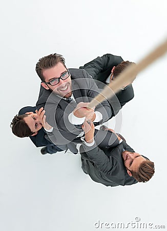 Top view .business team helps the boss to climb up. Stock Photo