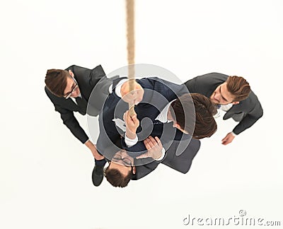 Top view .business team helps the leader to climb up. Stock Photo