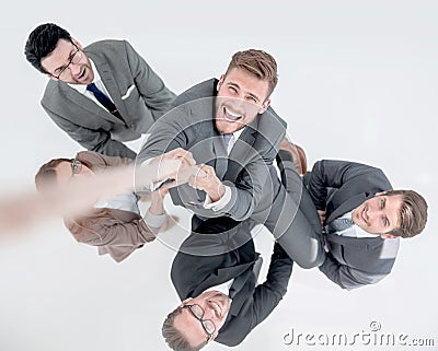 Top view .the business team helps the leader to rise up. Stock Photo