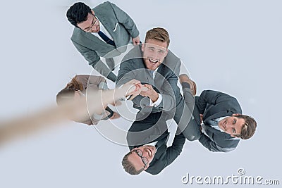 Top view .the business team helps the leader to rise up. Stock Photo