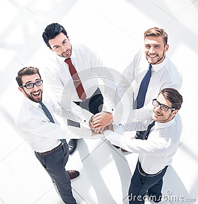 Top view. business team putting their hands together Stock Photo