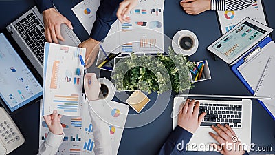 Top view of business teamwork analyzing company accounting paperwork Stock Photo