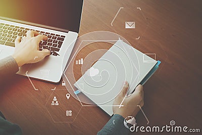 top view of businessman hand working with laptop computer and b Stock Photo