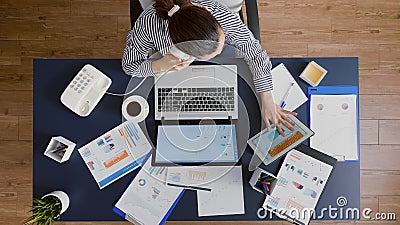 Top view of businesswoman discussing with manager explaining company statistics Stock Photo