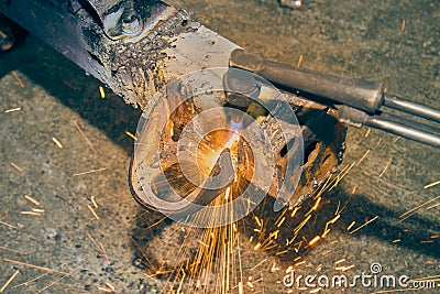 Top View Car Part Removal by Oxygen Acetylene Cutting Technique in Vintage Tone Stock Photo