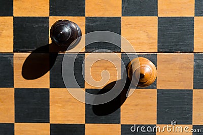 Top view Chess Bishops stand on a chessboard with shadows Stock Photo