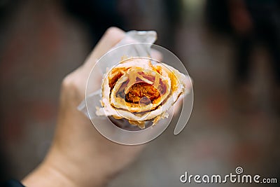 Top view of Chicken Kati Roll. It is a skewer-roasted kebab wrapped in a paratha bread. Street food in Kolkata, India Stock Photo