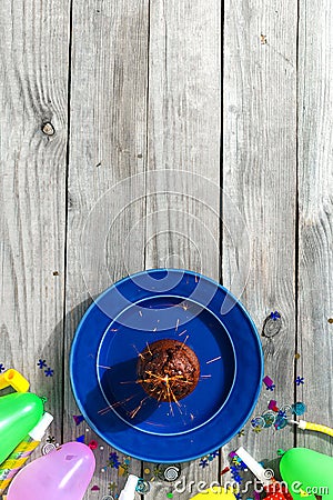 Top view children birthday table Chocolate muffin sparkler decor Stock Photo
