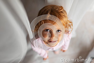 Top view of children at home looking in the camera. Stock Photo
