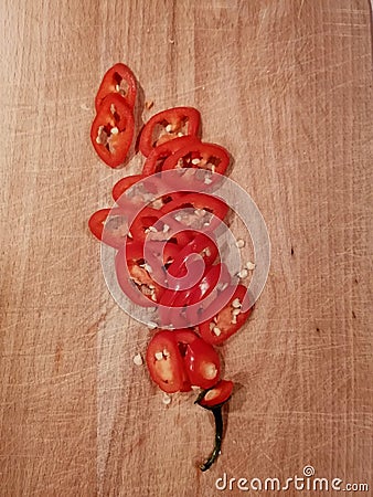 Top view of chopped chilli and seeds on the cutting board Stock Photo