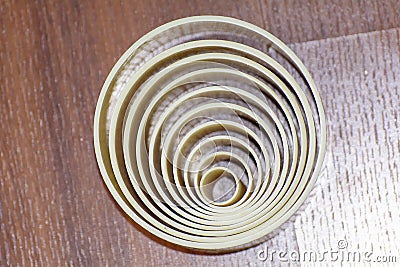 Top view of a circle is a simple shape in Euclidean geometry.a closed curve on a wooden surface Stock Photo