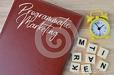 Notebook written with text PROGRAMMATIC MARKETING. Top view Stock Photo