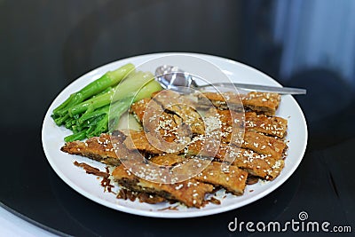 Top view Close-up image Thai food Baked duck fried with vegetables Delicious healthy food in a clean dish Stock Photo