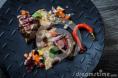 Top view closeup medium raw grilled meat with red pepper and sauce Stock Photo