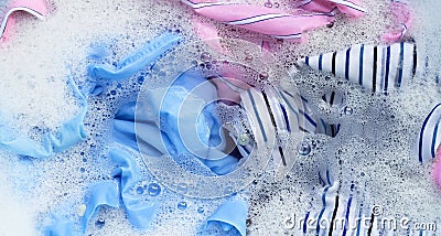 Clothes soak in powder detergent water dissolution. Laundry concept Stock Photo