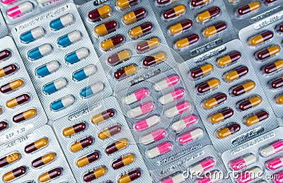 Top view of colorful antibiotic capsule pills in blister pack. Antibiotic drug resistance. Pharmaceutical industry. Pharmacy drug Stock Photo