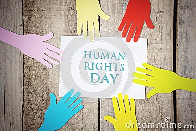 Colorful paper hands with Human Rights Day text Stock Photo