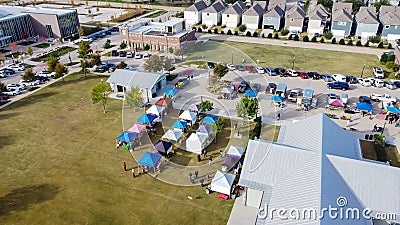 Top view colorful tents on grass lawn square at Farmer Market at Coppell Downtown, Texas, USA Editorial Stock Photo