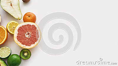 Top view of composition of various colorful fresh summer fruits isolated over white background, Copy space on the right Stock Photo