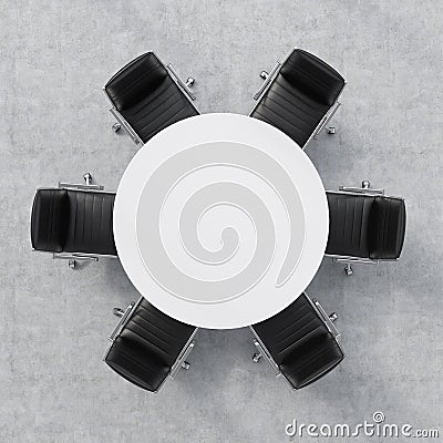 Top view of a conference room. A white round table and six chairs around. Office interior. 3D rendering. Stock Photo