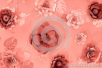 Top view of coral paper cut palm leaves and flowers, minimalistic background. Stock Photo